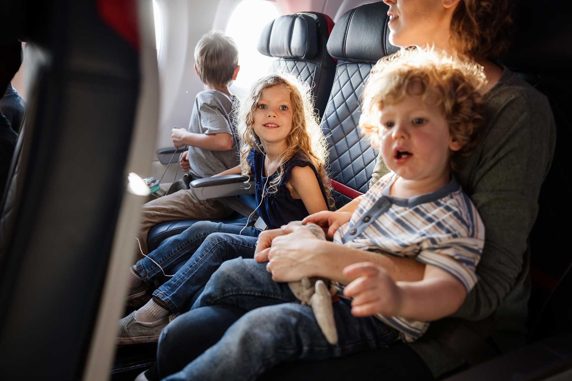 A family travelling with children on a long-haul flight